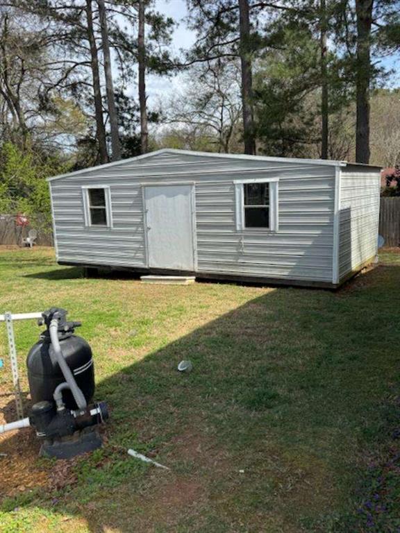 45 Plainview Street Rockmart, GA 30153 - Photo 22 of 24 a view of a house with a backyard