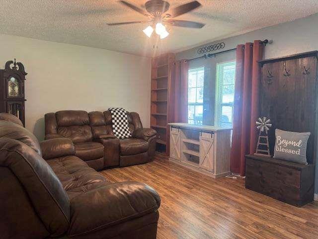 45 Plainview Street Rockmart, GA 30153 - Photo 3 of 24 a living room with furniture and a fireplace