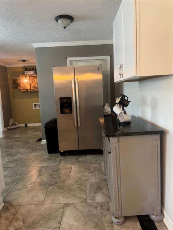 45 Plainview Street Rockmart, GA 30153 - Photo 7 of 24 a kitchen with stainless steel appliances granite countertop a refrigerator a stove and a sink