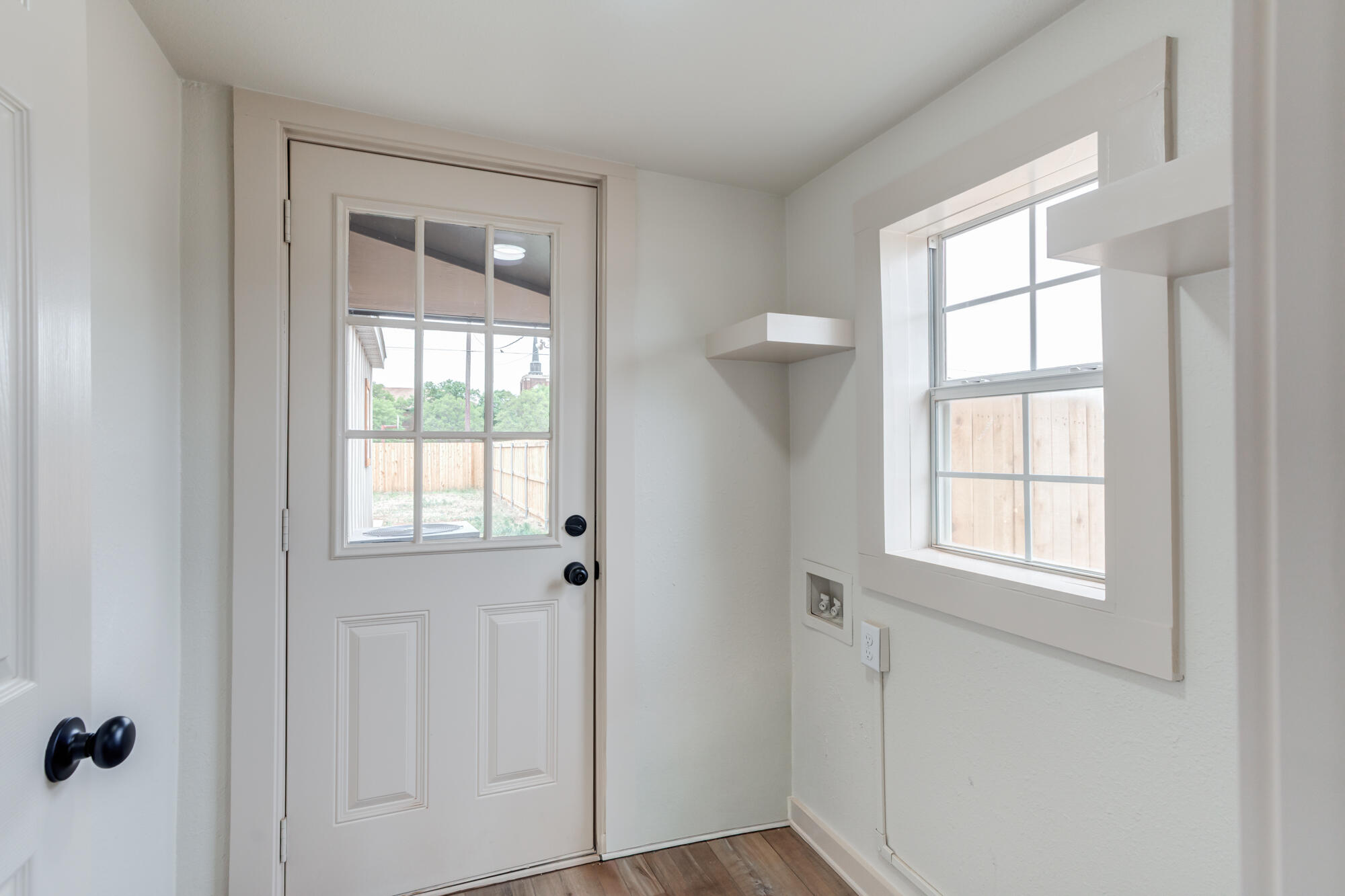 315 West Garza Street Slaton, TX 79364 - Photo 18 of 35 a view of an empty room with a window