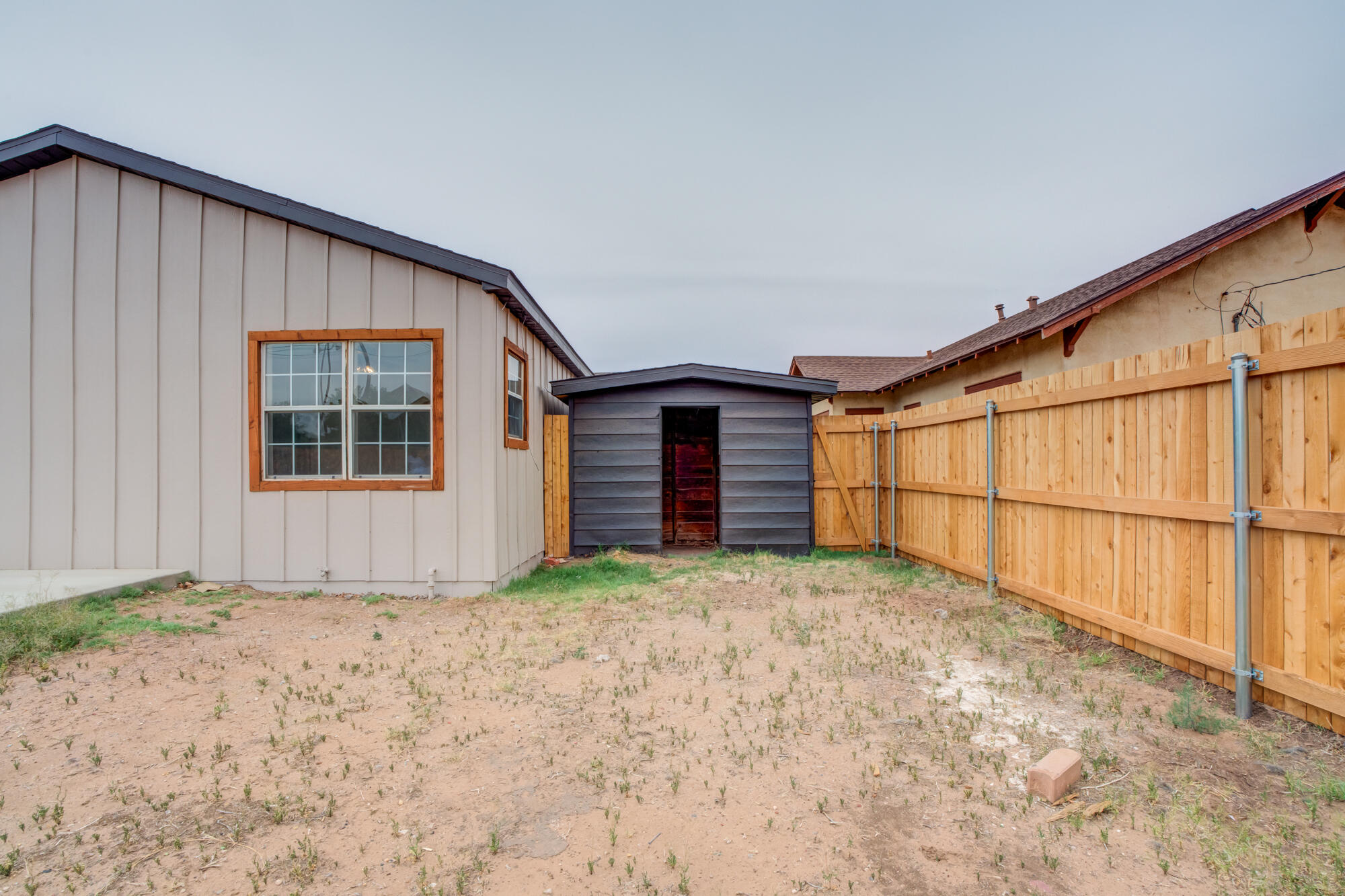 315 West Garza Street Slaton, TX 79364 - Photo 35 of 35 a view of backyard with garage
