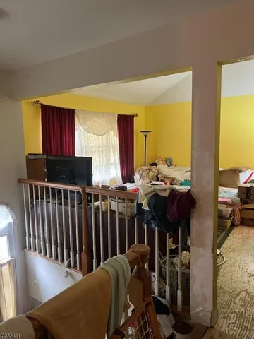 a view of a livingroom with furniture