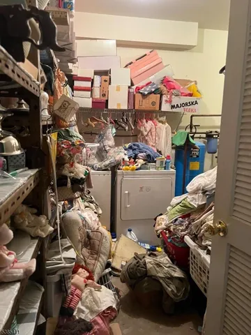 a store room with lots of different colored cloths