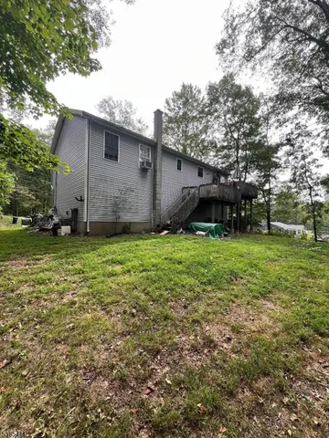 a view of a backyard with stairs
