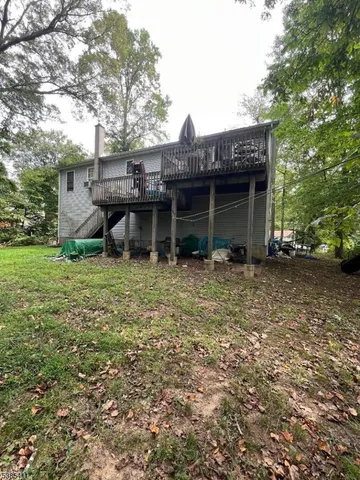 a backyard of a house with seating space