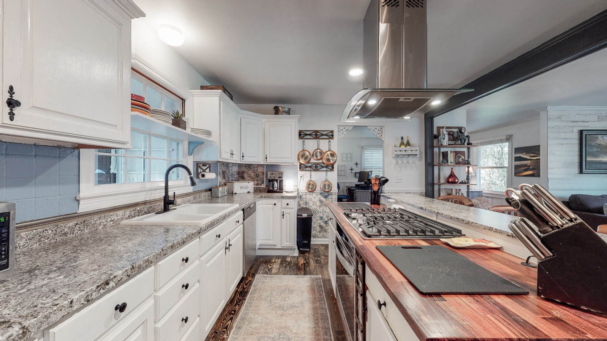 1108 Berwick Trail Madison, TN 37115 - Photo 17 of 54 a kitchen with granite countertop a stove sink and cabinets