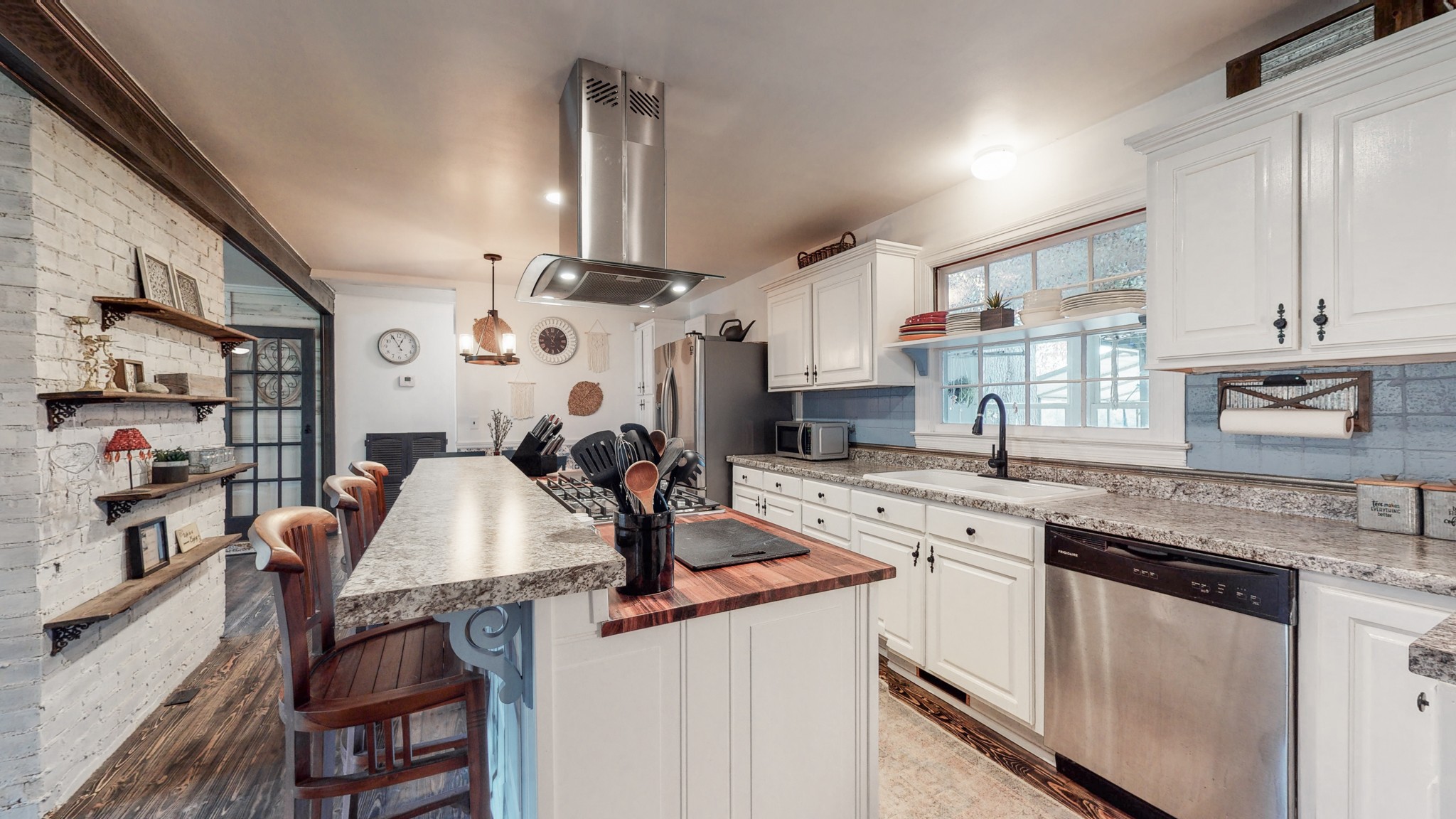 1108 Berwick Trail Madison, TN 37115 - Photo 19 of 54 a kitchen with stainless steel appliances kitchen island granite countertop a sink and cabinets