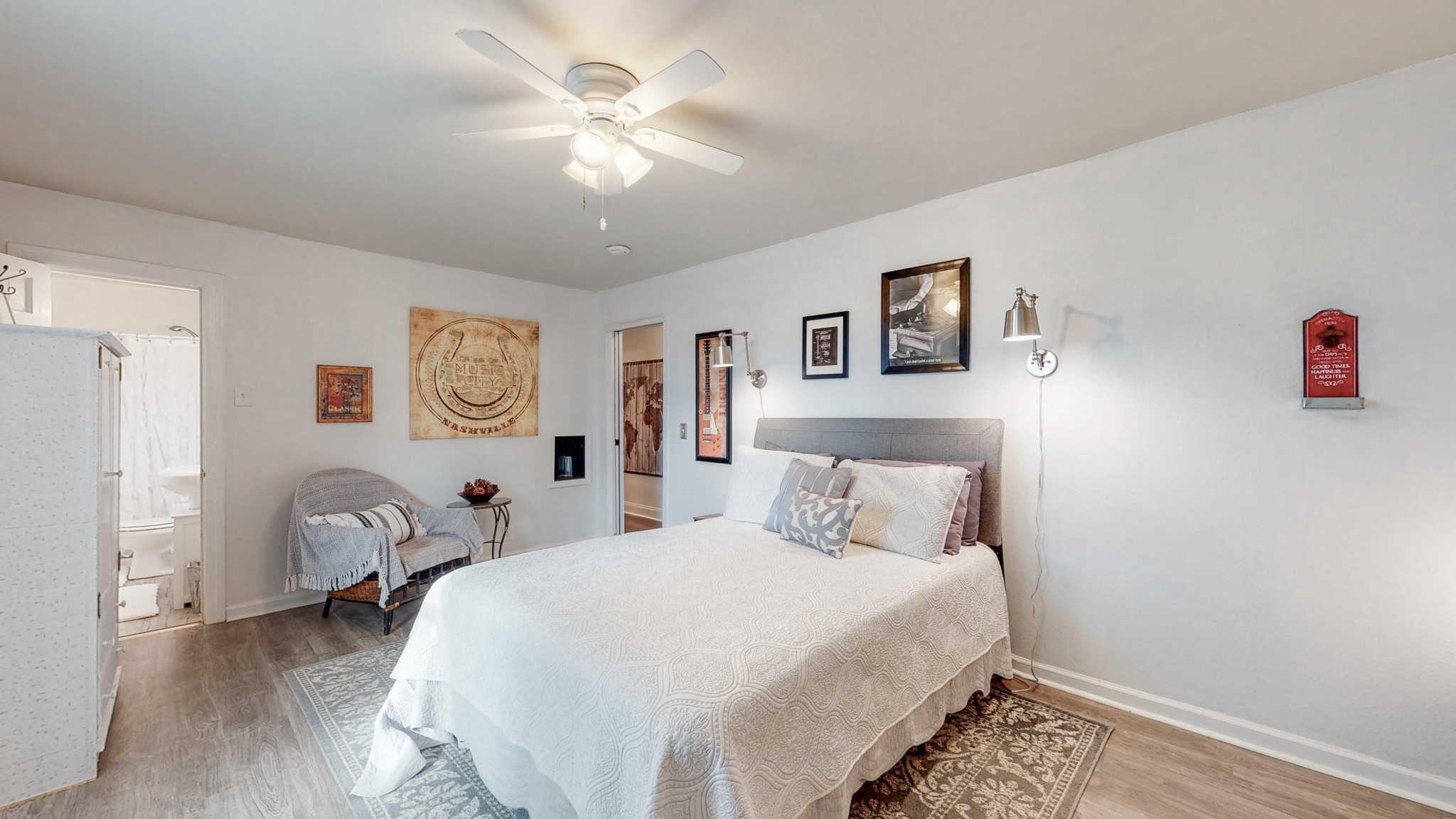 1108 Berwick Trail Madison, TN 37115 - Photo 28 of 54 a bedroom with a bed and a chandelier