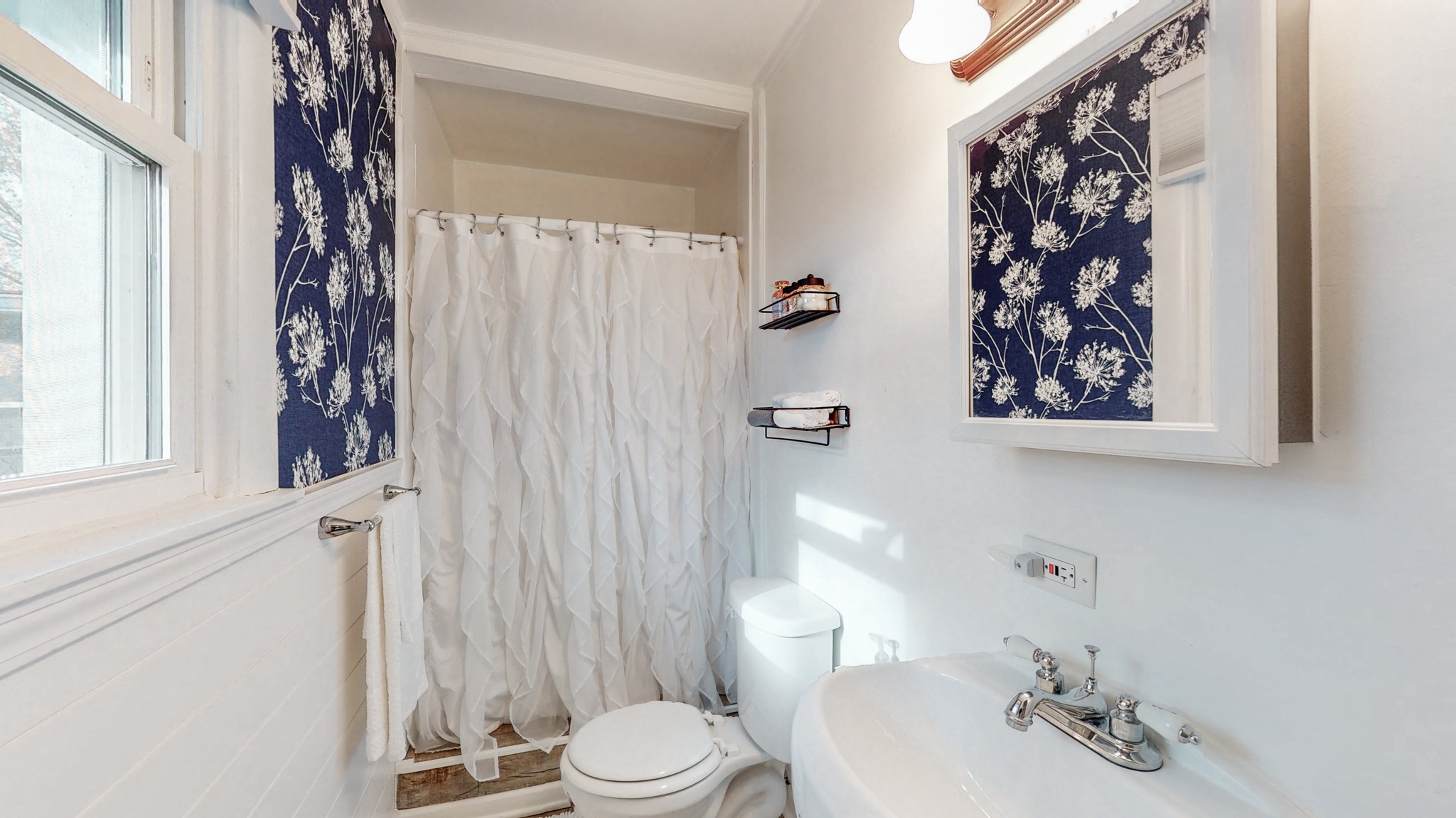 1108 Berwick Trail Madison, TN 37115 - Photo 29 of 54 a bathroom with a sink a toilet and shower curtain