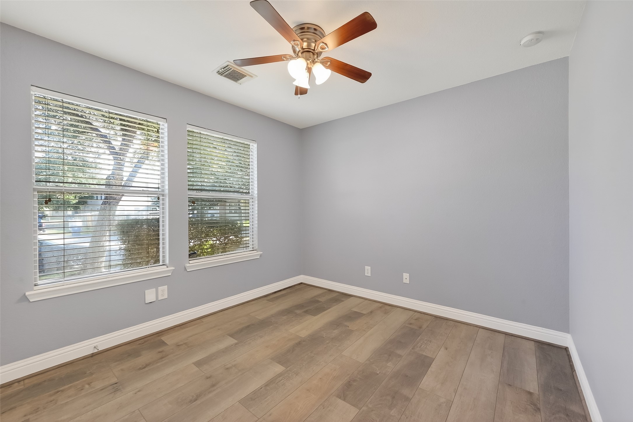 29603 Golden Vines Lane Spring, TX 77386 - Photo 19 of 23 wooden floor in an empty room with a window