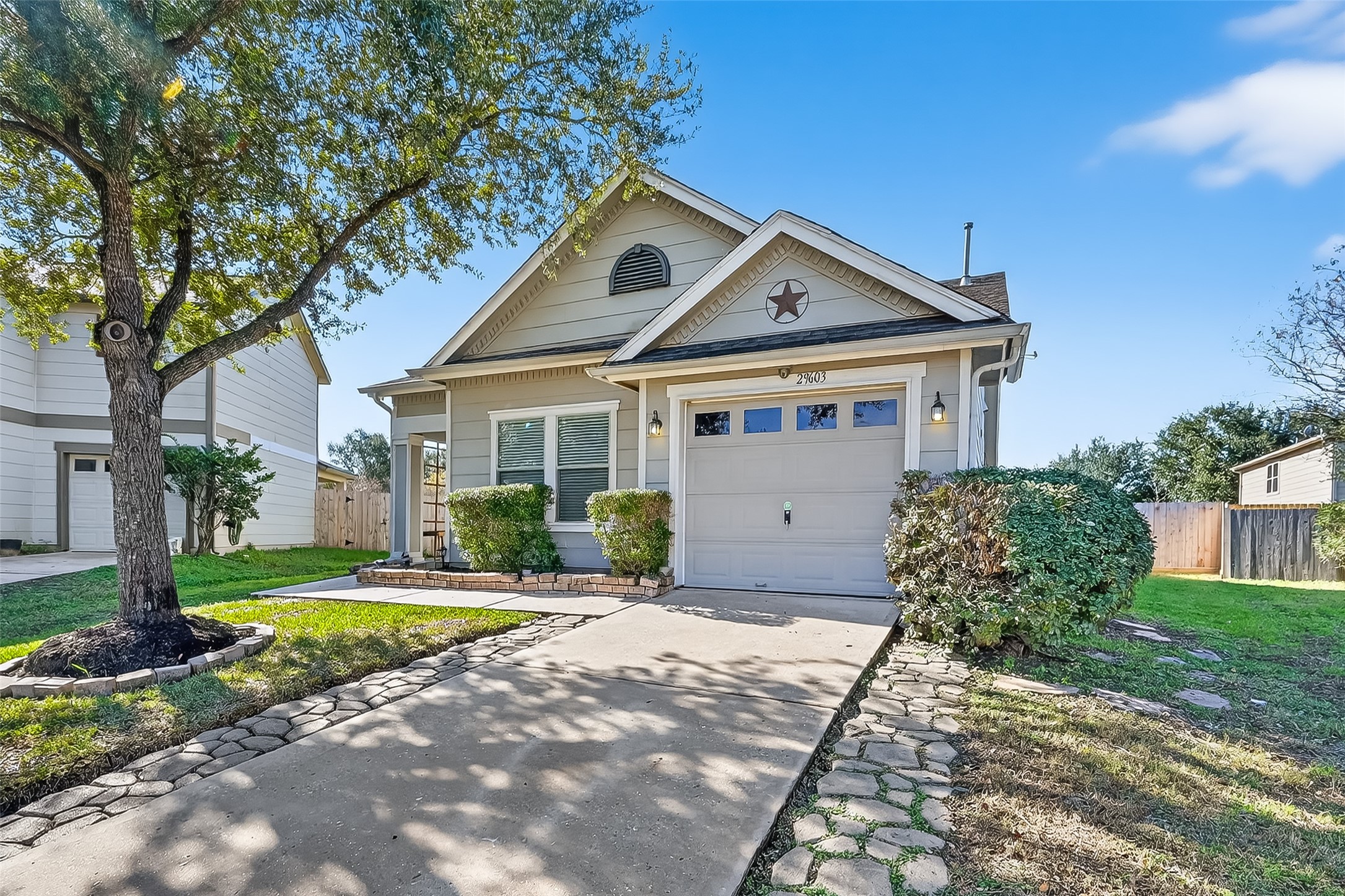 29603 Golden Vines Lane Spring, TX 77386 - Photo 2 of 23 a front view of a house with a yard