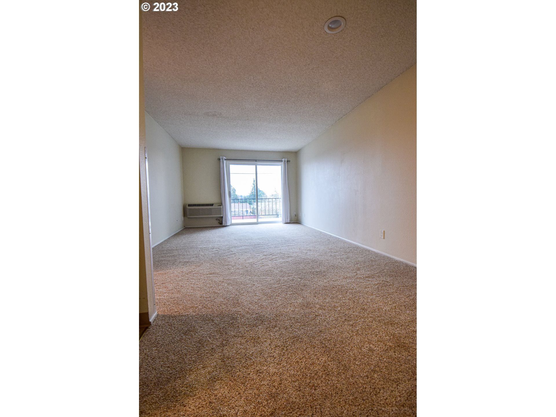 950 Evergreen Road, Unit 312 Woodburn, OR 97071 - Photo 6 of 16 a view of a room with windows