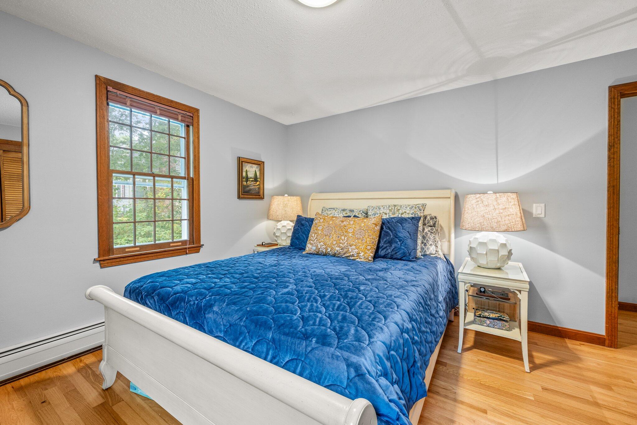 243 Commons Way Brewster, MA 02631 - Photo 11 of 32 a bedroom with a bed and a window