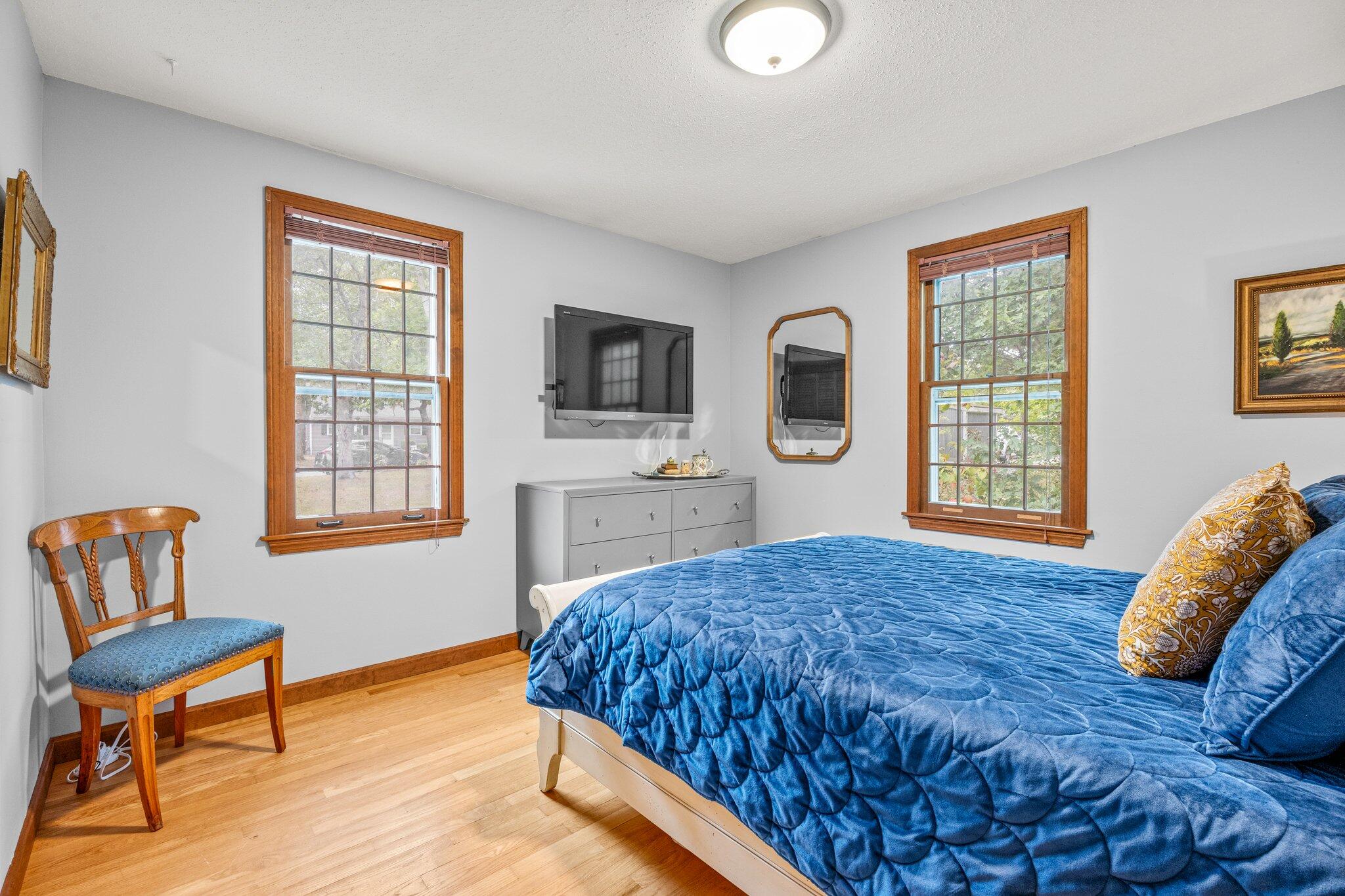 243 Commons Way Brewster, MA 02631 - Photo 12 of 32 a bedroom with a bed and a couch