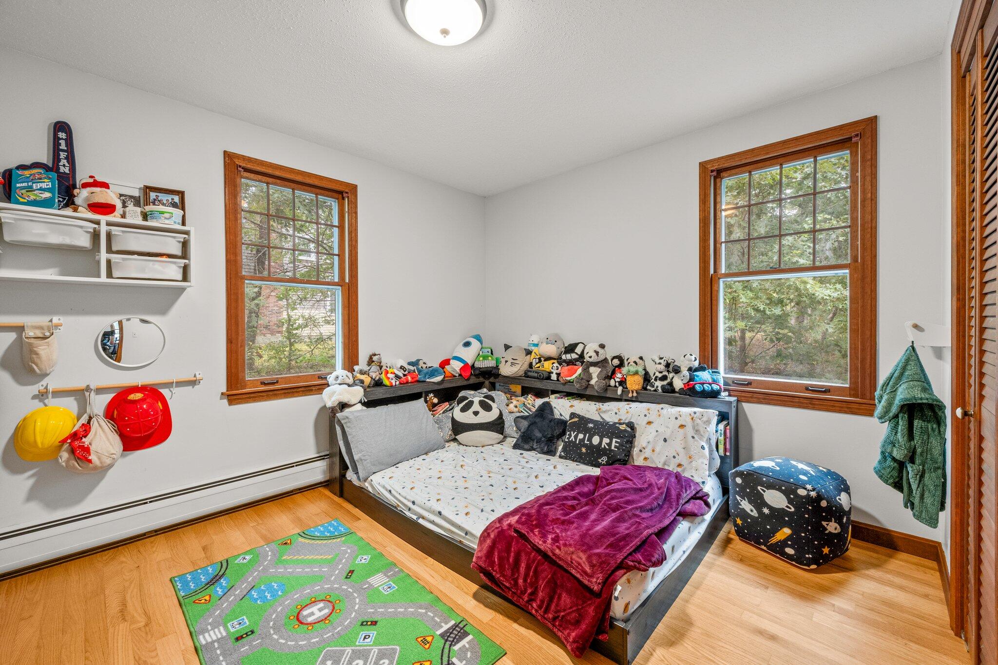 243 Commons Way Brewster, MA 02631 - Photo 14 of 32 a bedroom with bed and a window