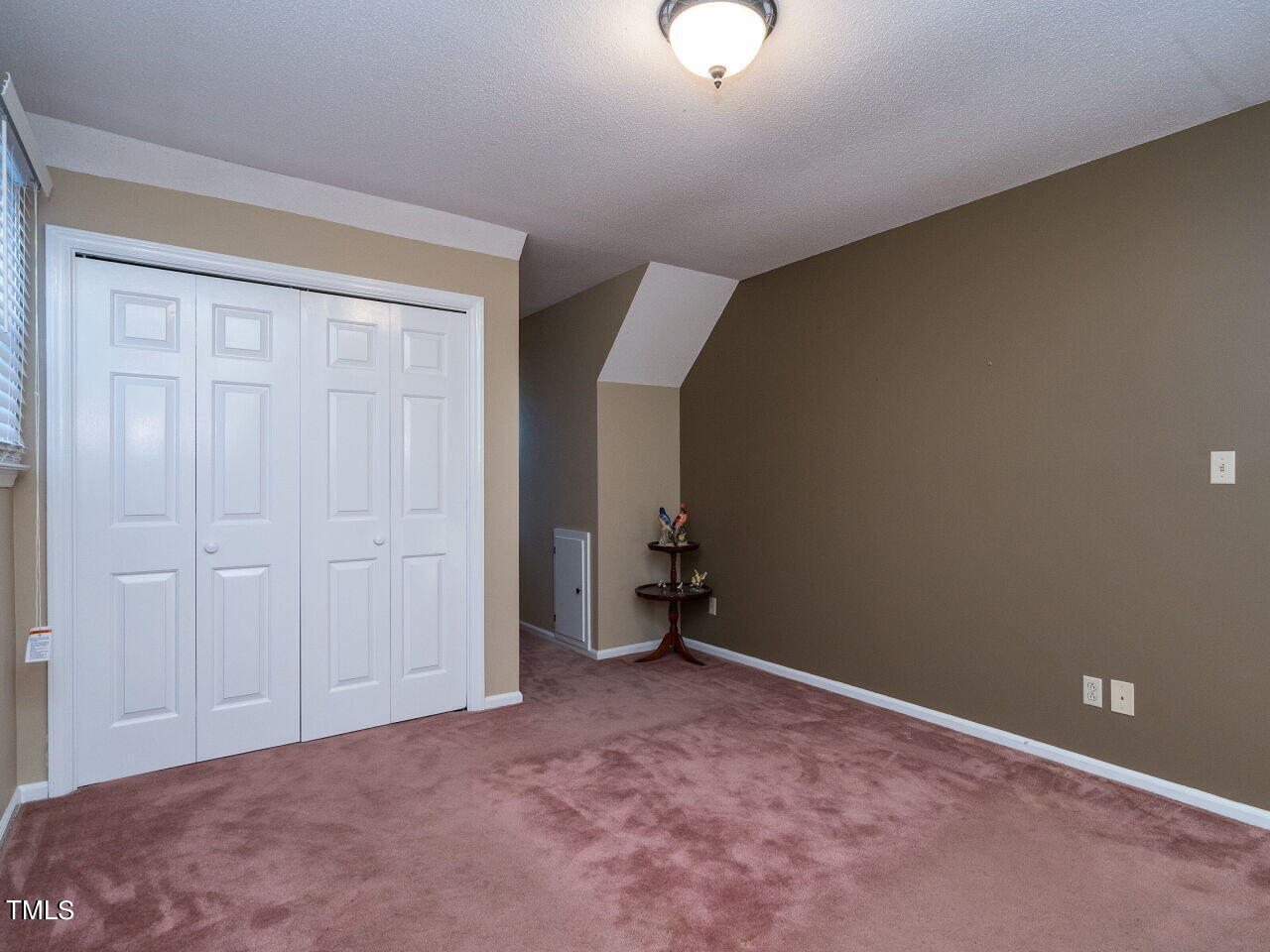 402 Hillside Drive Smithfield, NC 27577 - Photo 22 of 27 an empty room with a workbench
