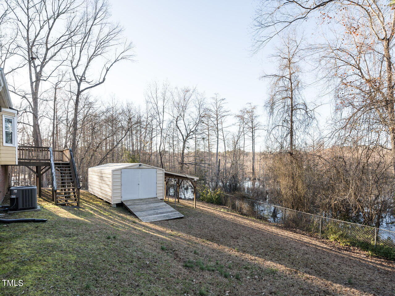 402 Hillside Drive Smithfield, NC 27577 - Photo 24 of 27 a view of a back yard of the house