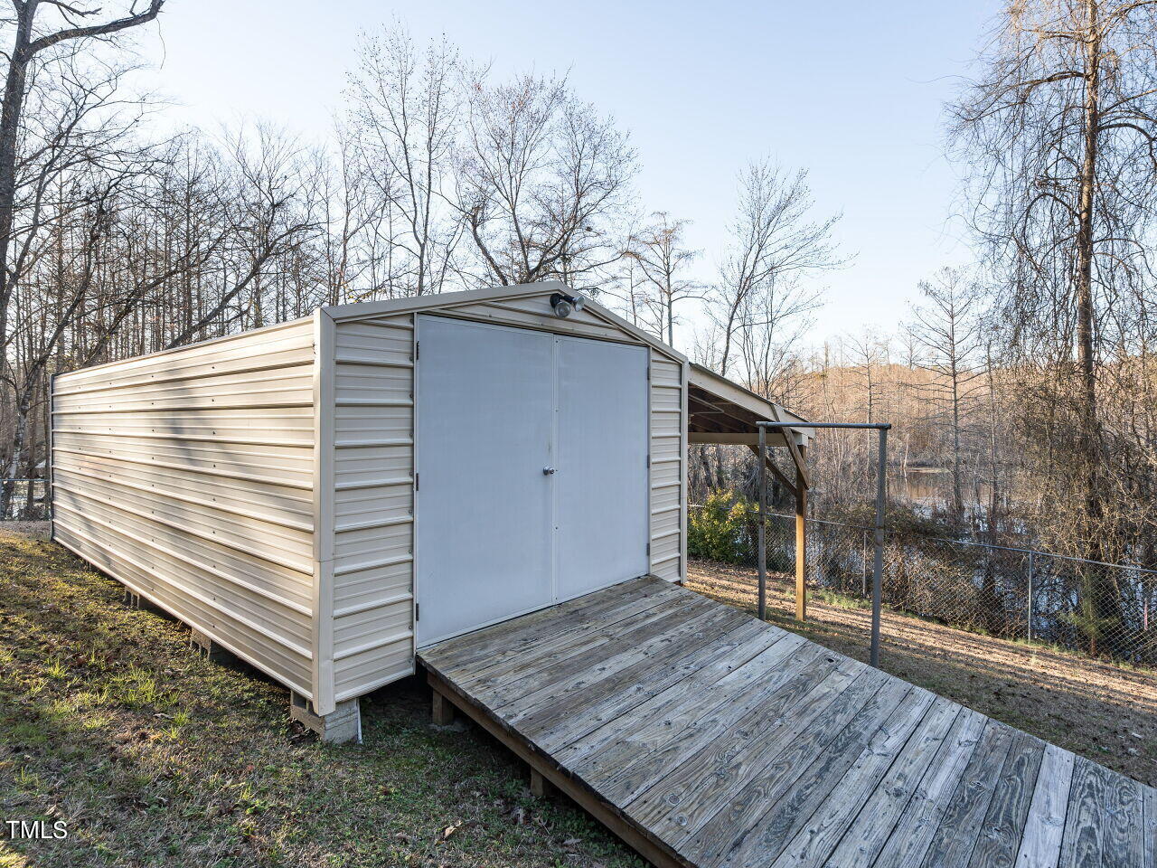 402 Hillside Drive Smithfield, NC 27577 - Photo 25 of 27 a view of a house with a yard