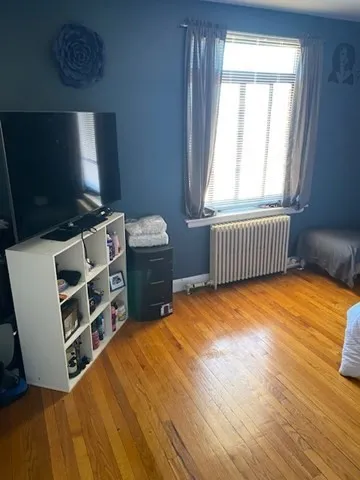 a bathroom with a sink toilet and a mirror