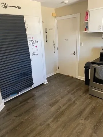 a view of a storage & utility room with a sink
