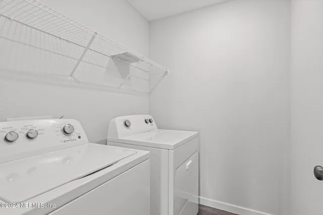 a view of a house with a yard and a garden