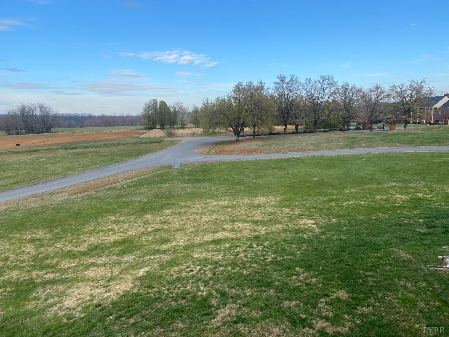 107 Manor Drive Forest, VA 24551 - Photo 20 of 20 a view of field with trees in background