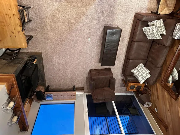a view of workspace with lounge chair