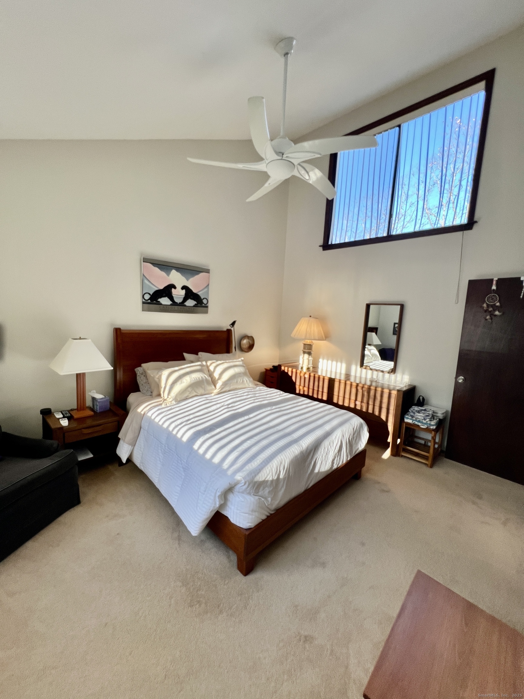 207 Ledge Drive Torrington, CT 06790 - Photo 12 of 18 a bedroom with a bed and a chair