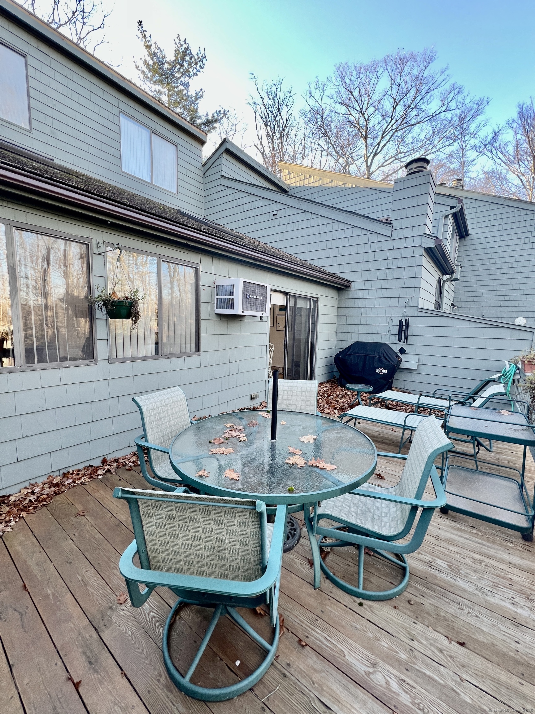207 Ledge Drive Torrington, CT 06790 - Photo 17 of 18 a backyard of a house with seating space