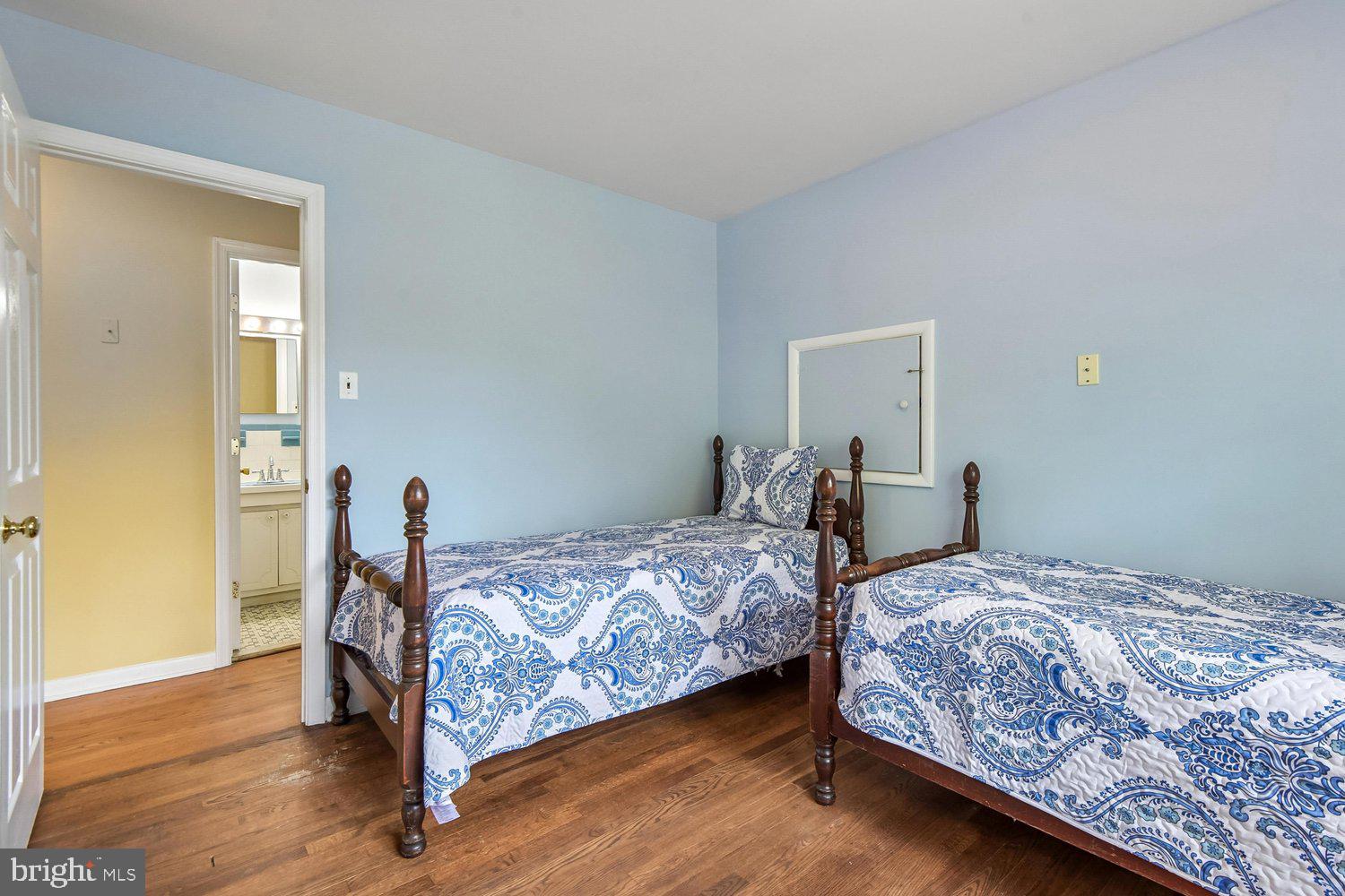 1518 Winchester Road Annapolis, MD 21409 - Photo 39 of 70 a bedroom with a bed and wooden floor