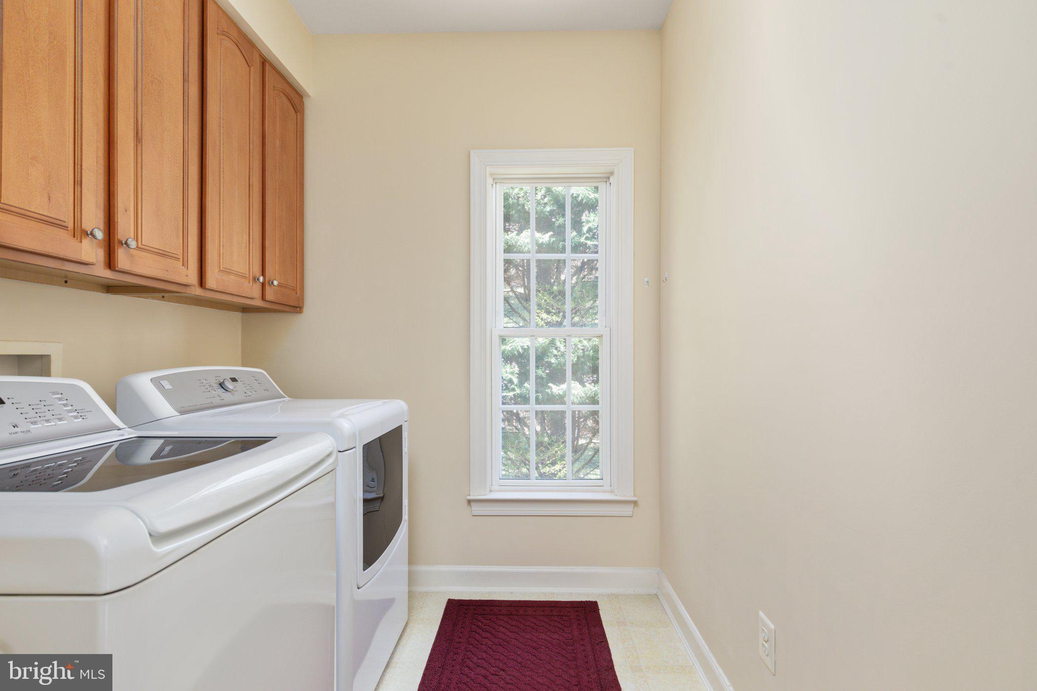 5664 Lick River Lane Gainesville, VA 20155 - Photo 22 of 43 laundry room on main level--laundry chute in place