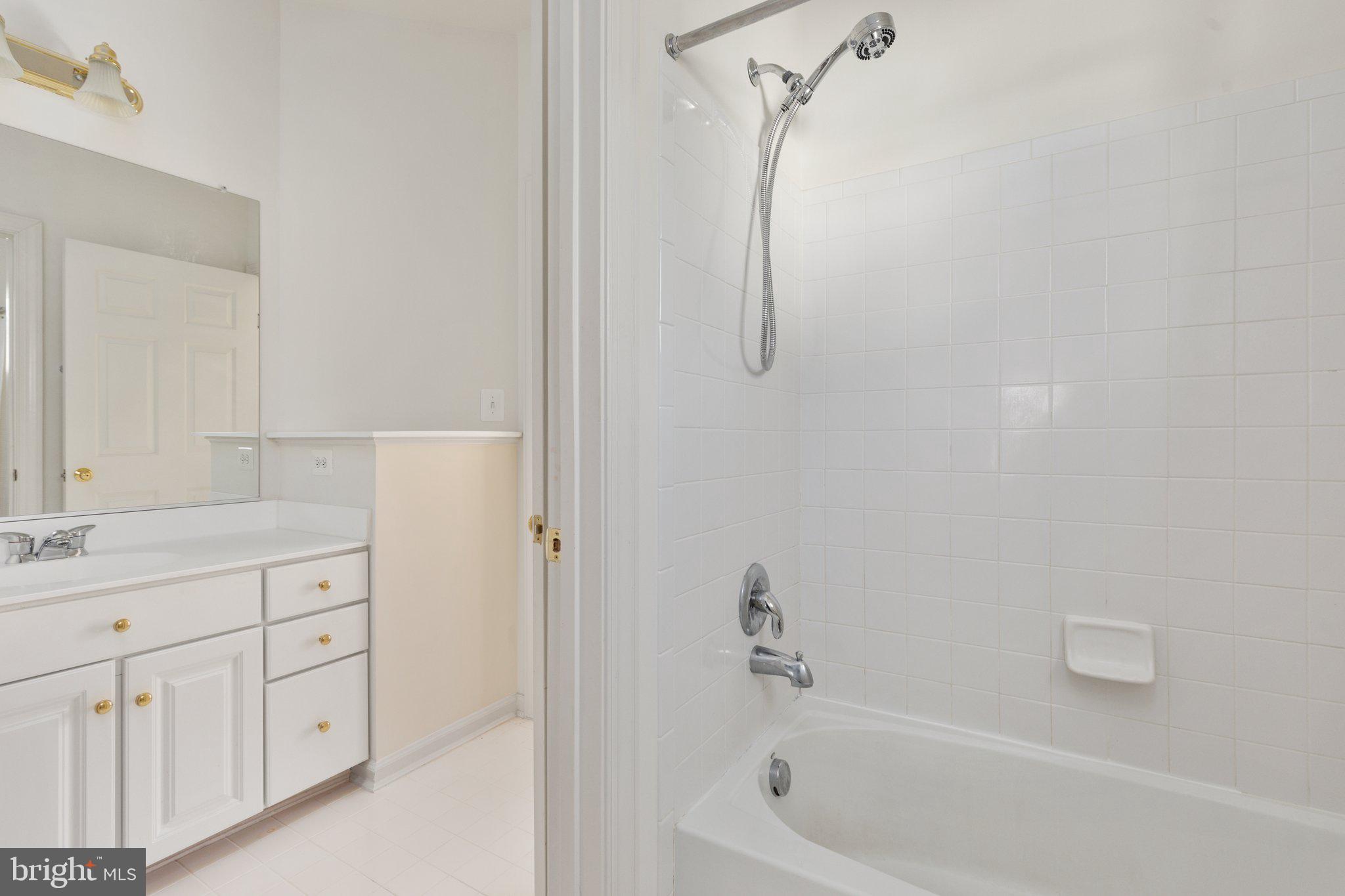 5664 Lick River Lane Gainesville, VA 20155 - Photo 35 of 43 The bathroom boasts separate vanity rooms