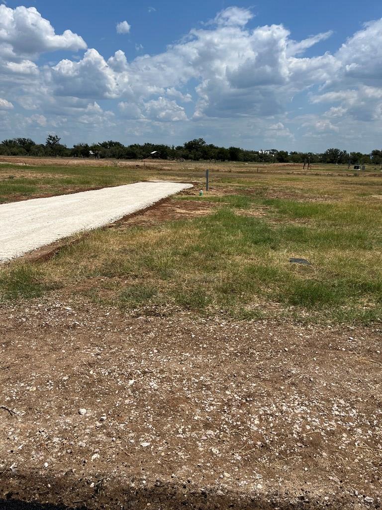 193 Arch Ray Loop, Unit 193 Fredericksburg, TX 78624 - Photo 2 of 4 a view of an ocean and beach