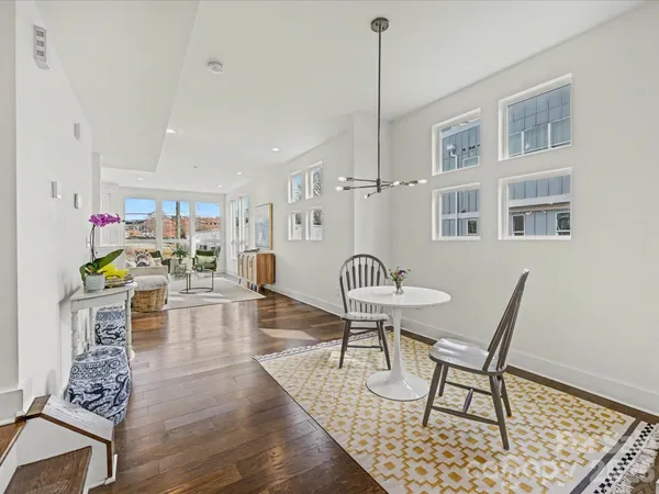 a living room with furniture and a table