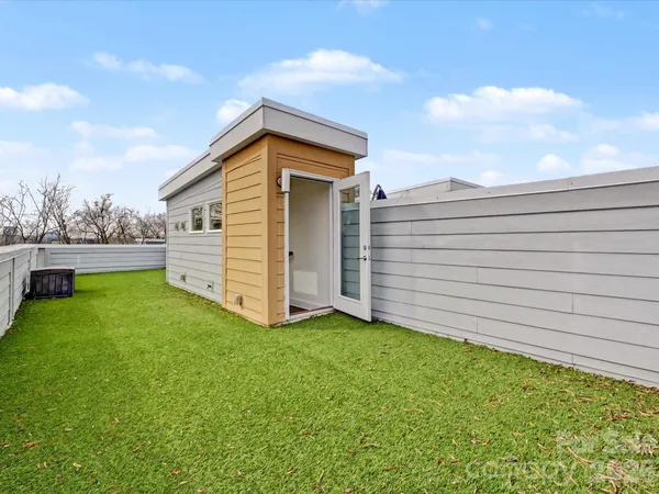 a view of a backyard with a garden