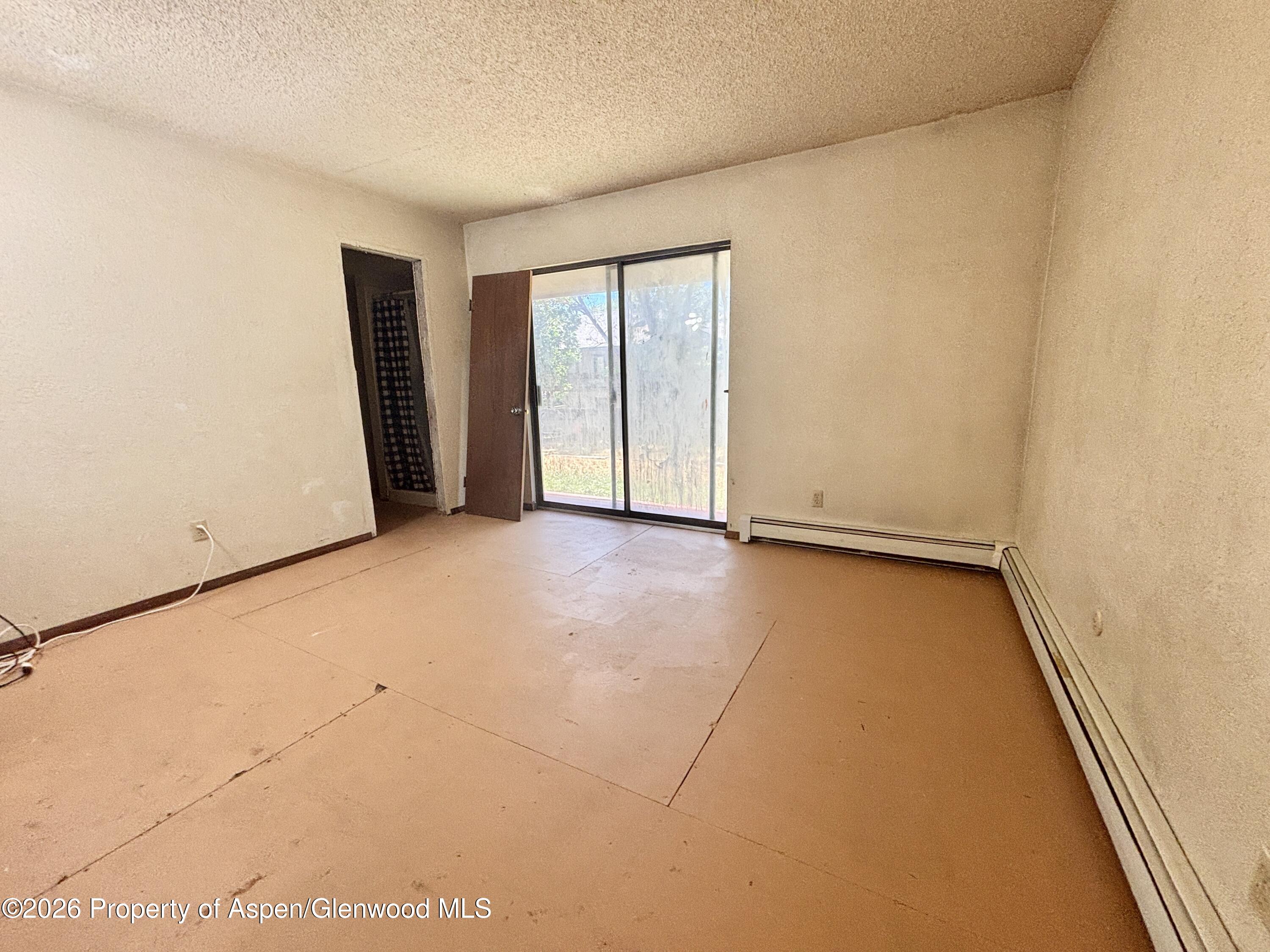 1623 West 7th Street Rifle, CO 81650 - Photo 7 of 21 an empty room with window