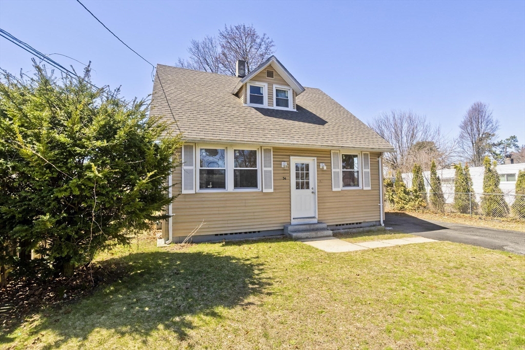 34 Temby Street Springfield, MA 01119 - Photo 14 of 22 a front view of a house with a yard