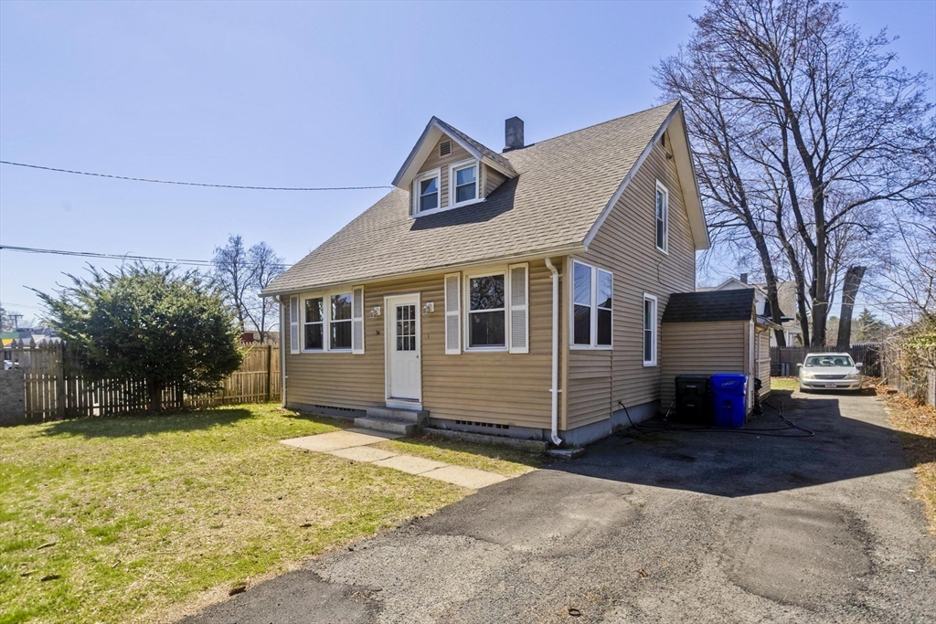 34 Temby Street Springfield, MA 01119 - Photo 16 of 22 a front view of a house with a yard