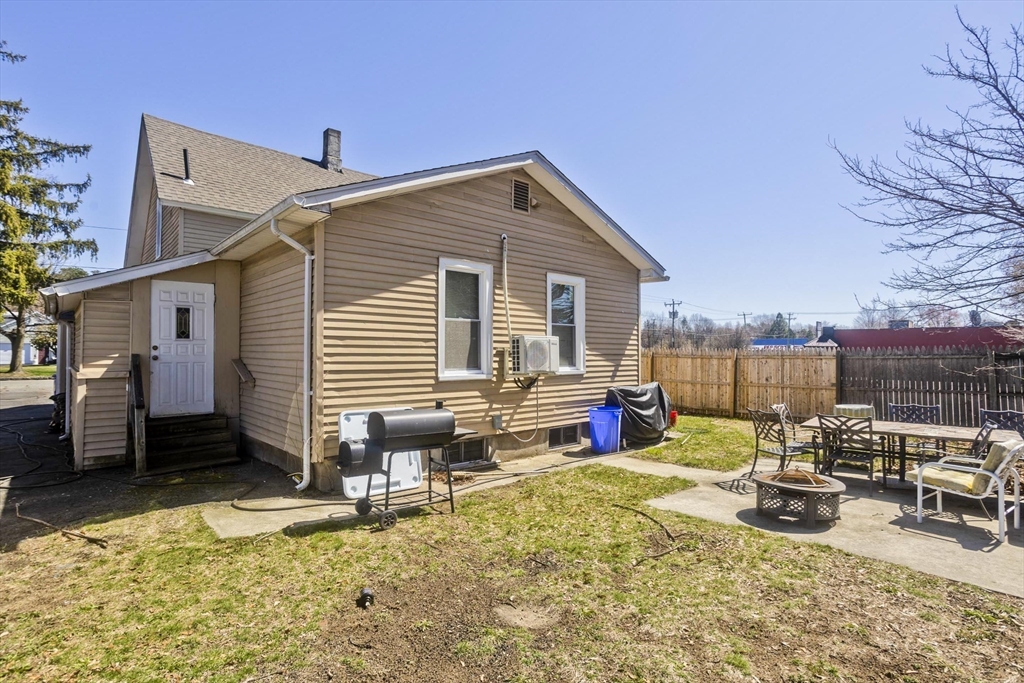34 Temby Street Springfield, MA 01119 - Photo 17 of 22 a view of a dinning table and chairs in the patio