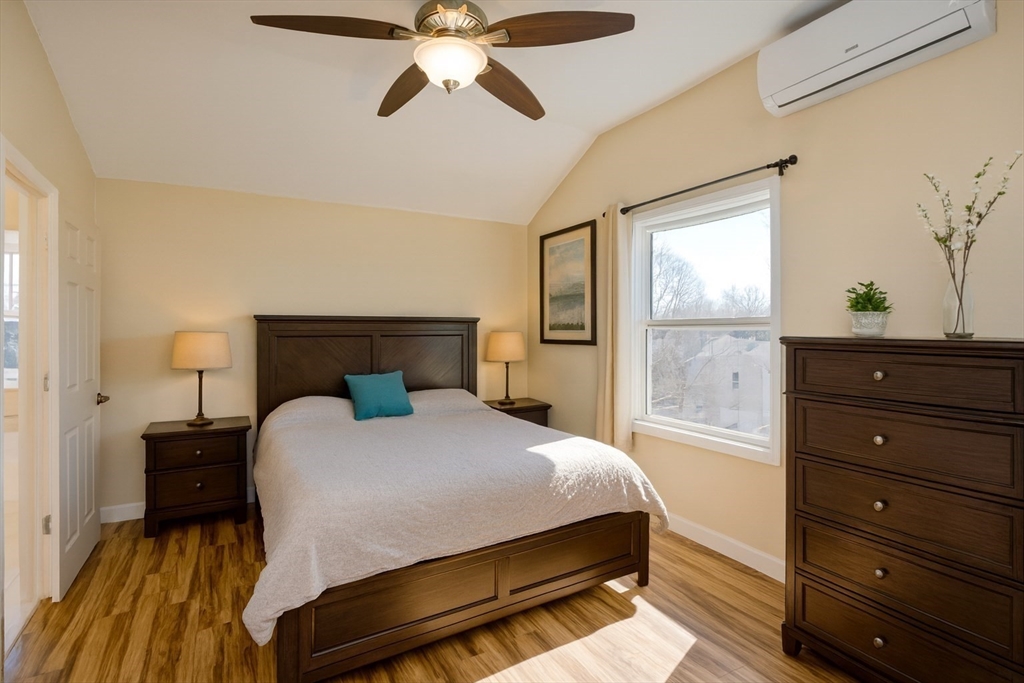 34 Temby Street Springfield, MA 01119 - Photo 7 of 22 a bedroom with a bed and a window