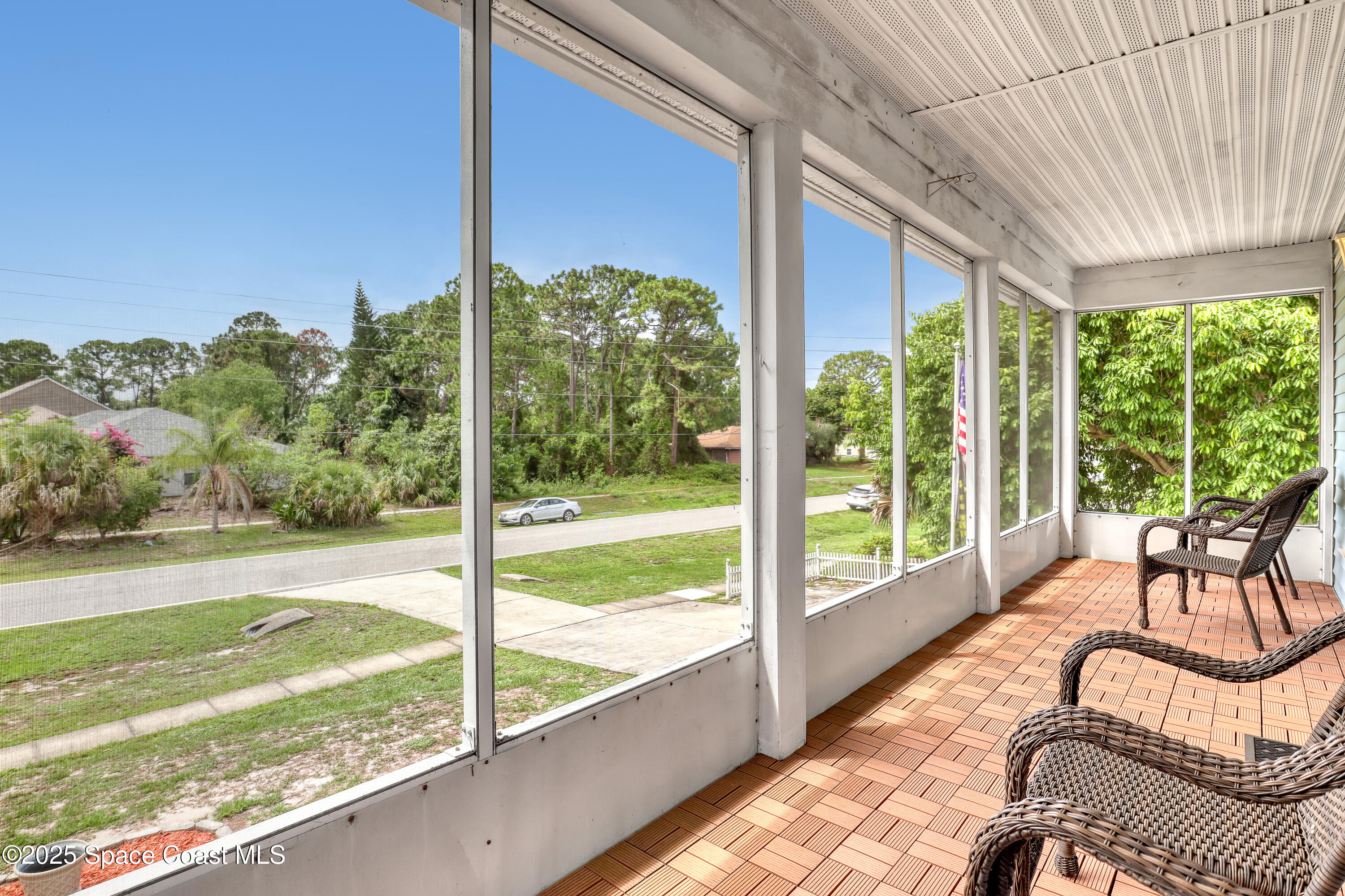 5280 Curtis Boulevard Cocoa, FL 32927 - Photo 29 of 45 a view of a two chair in the balcony