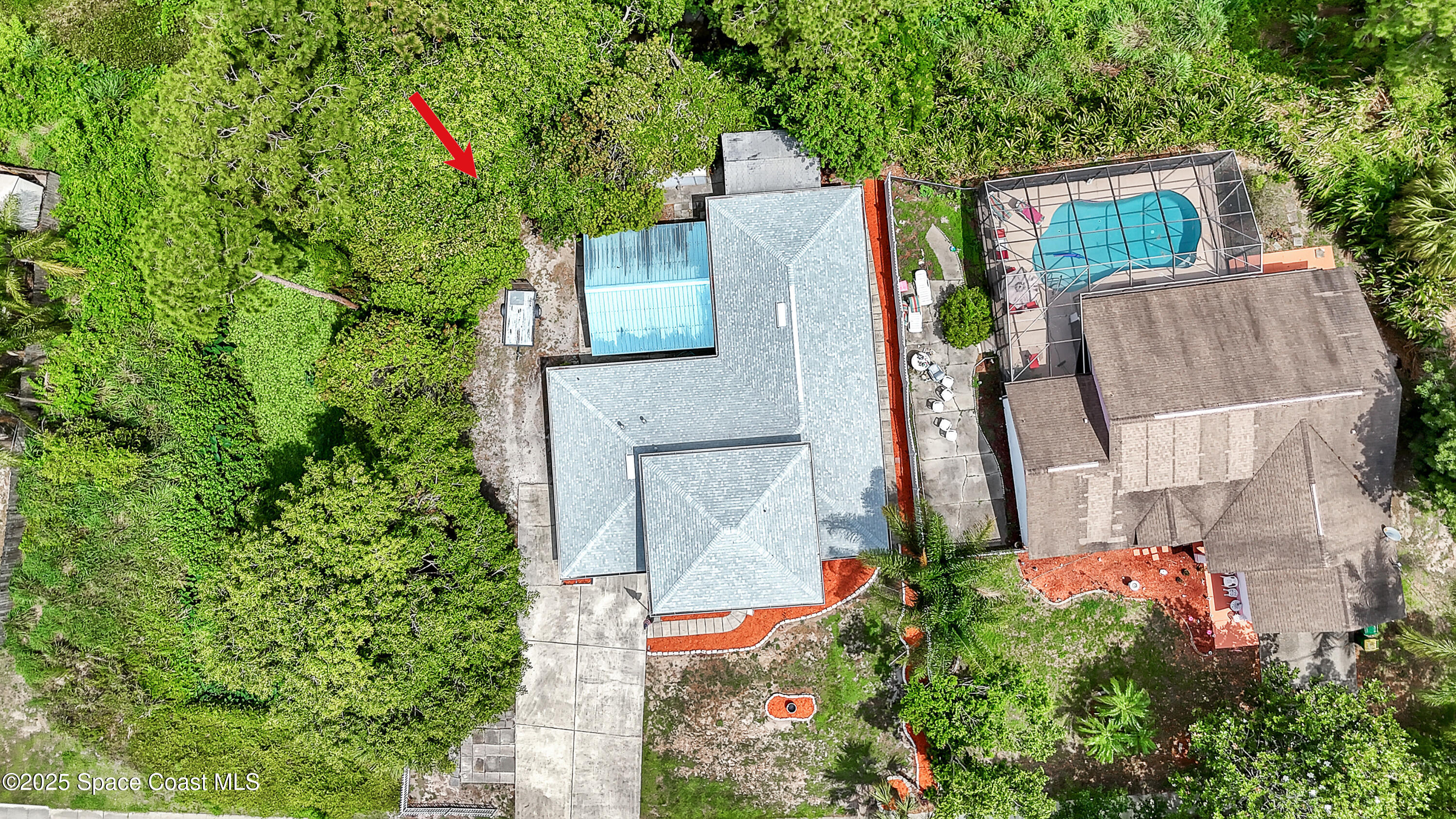 5280 Curtis Boulevard Cocoa, FL 32927 - Photo 3 of 45 an aerial view of a house