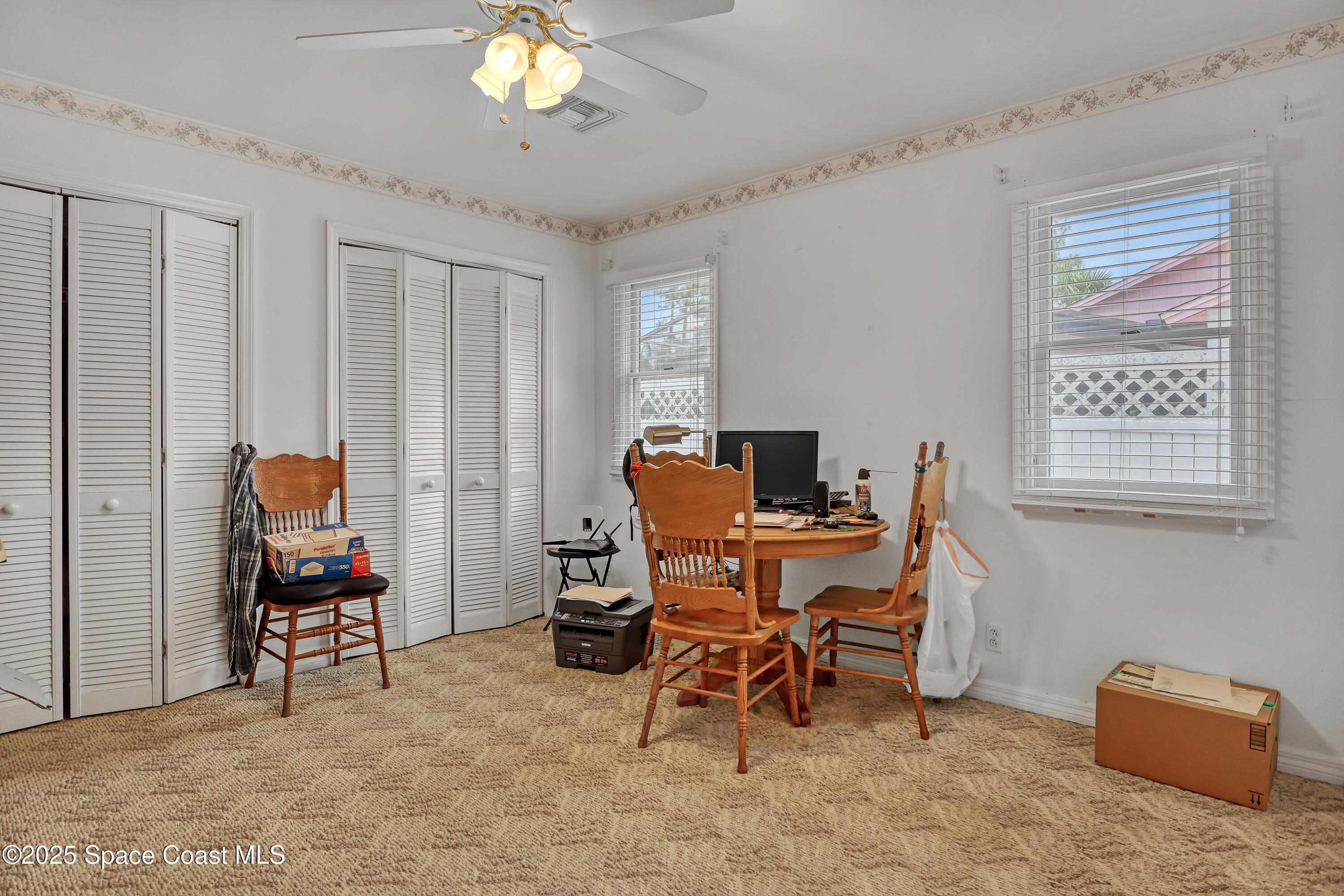 5280 Curtis Boulevard Cocoa, FL 32927 - Photo 35 of 45 a view of a workspace with furniture and a window