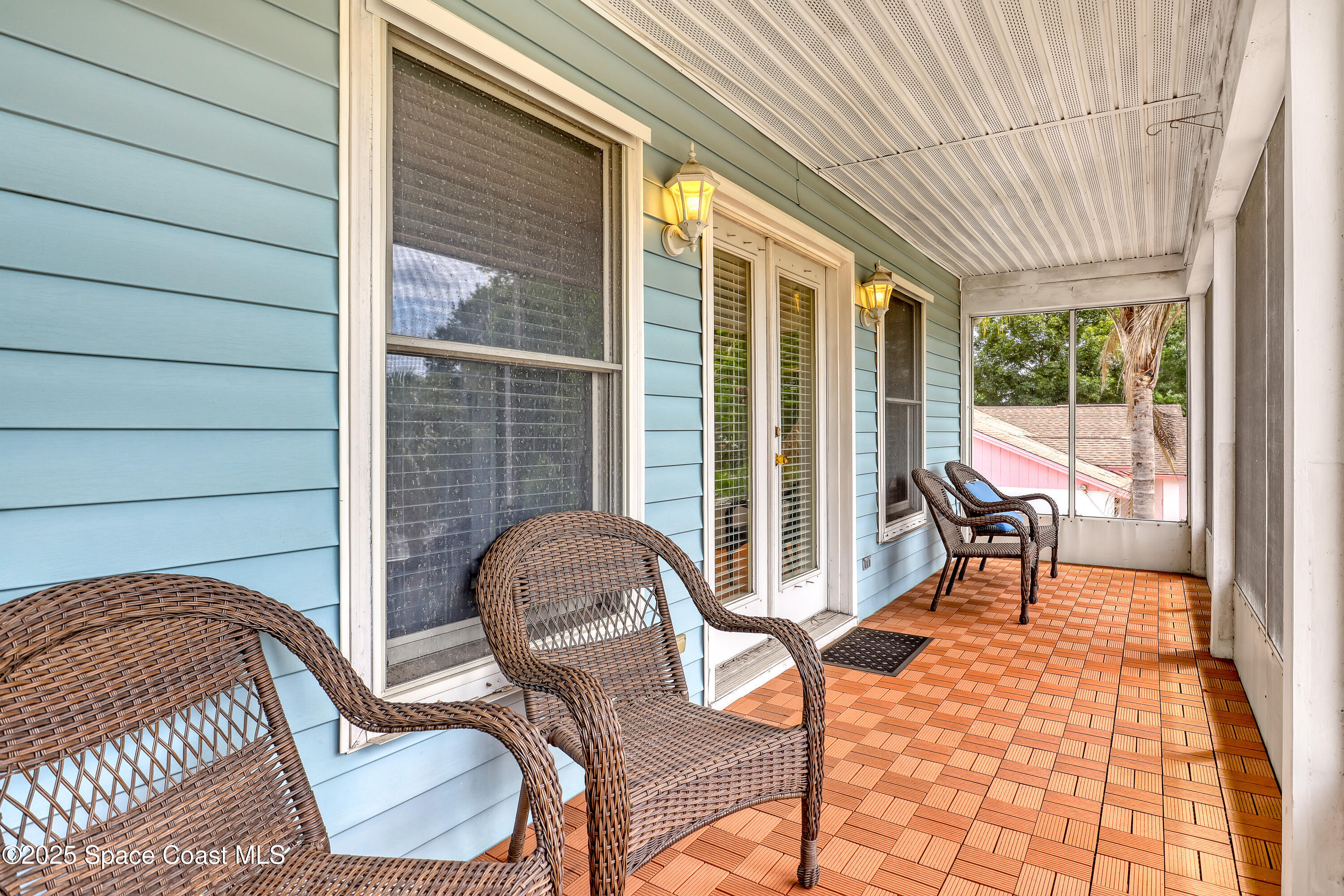 5280 Curtis Boulevard Cocoa, FL 32927 - Photo 36 of 45 a view of a porch with chairs