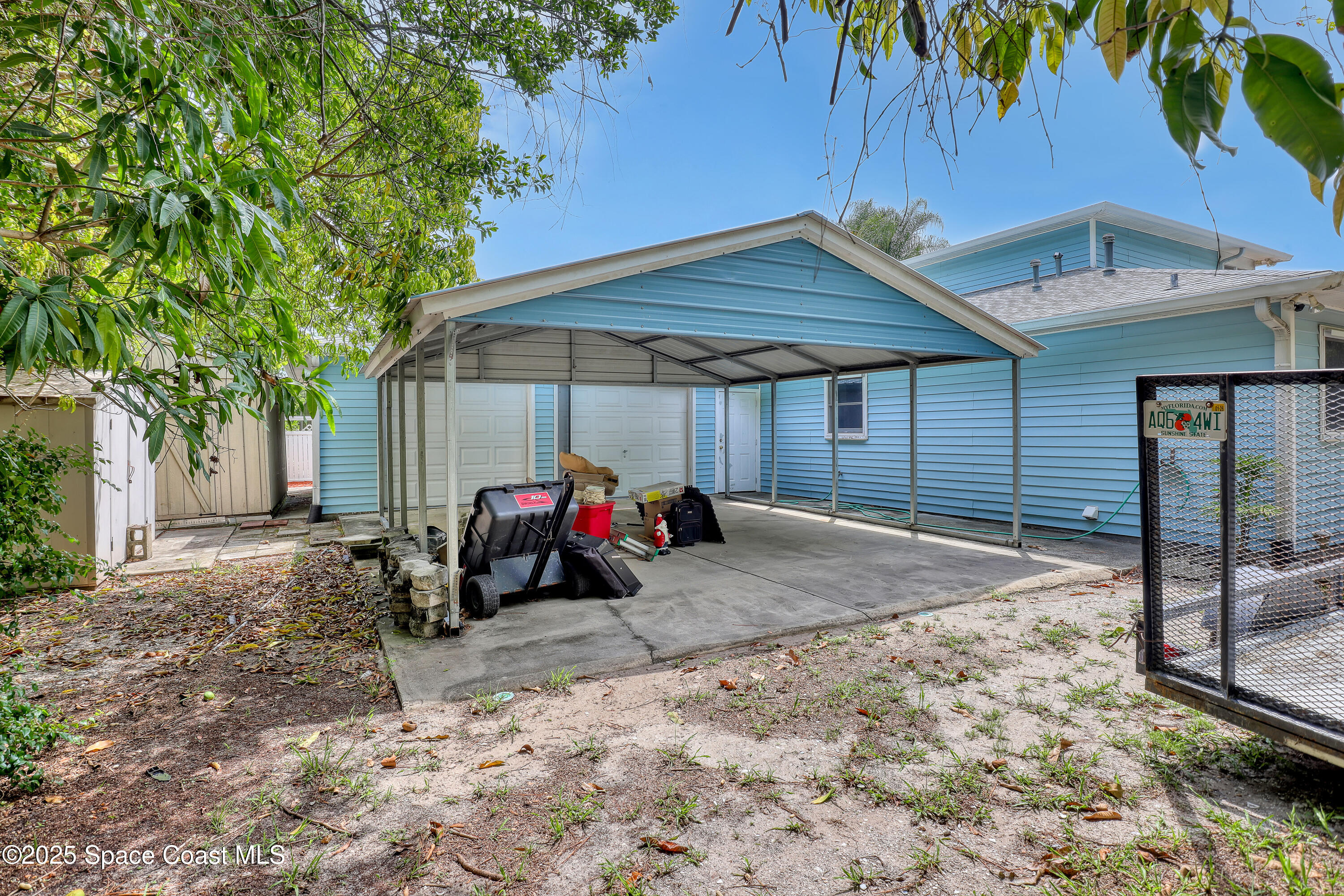 5280 Curtis Boulevard Cocoa, FL 32927 - Photo 39 of 45 a view of a house with a patio
