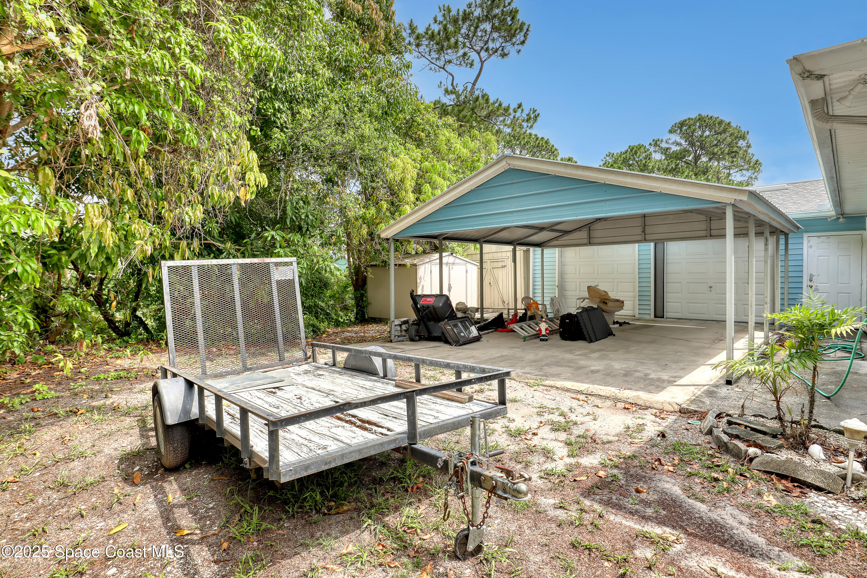 5280 Curtis Boulevard Cocoa, FL 32927 - Photo 40 of 45 a view of a backyard with sitting area