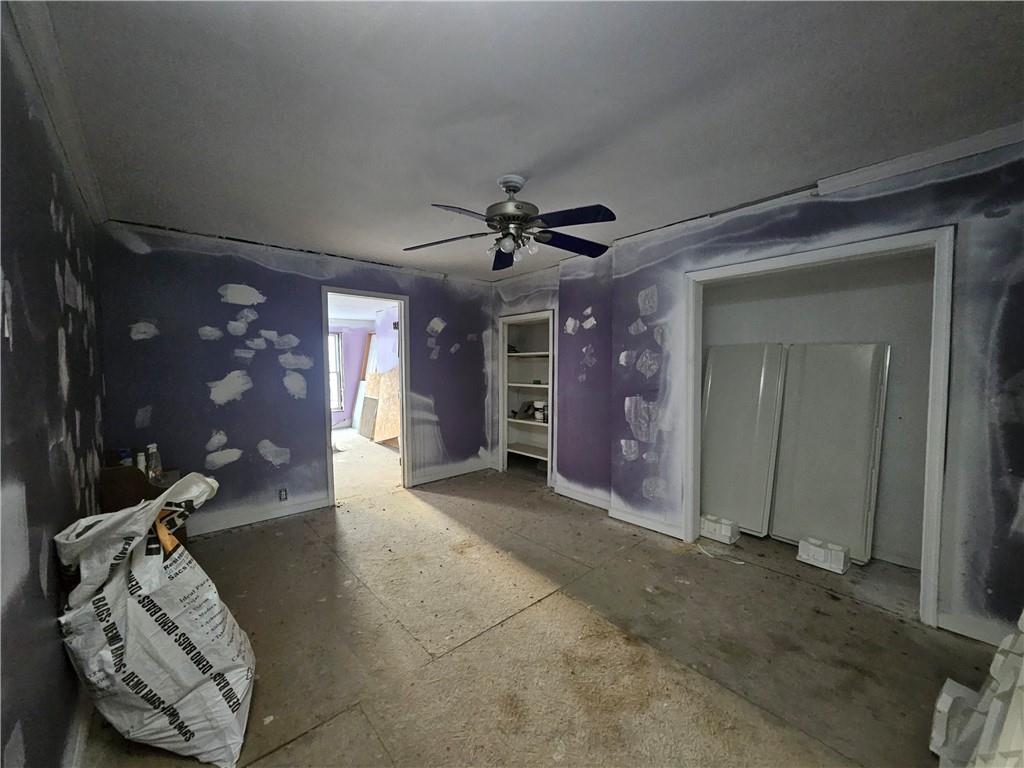 418 Ella Street Bloomfield, PA 15224 - Photo 12 of 14 a view of livingroom with hardwood floor and a ceiling fan
