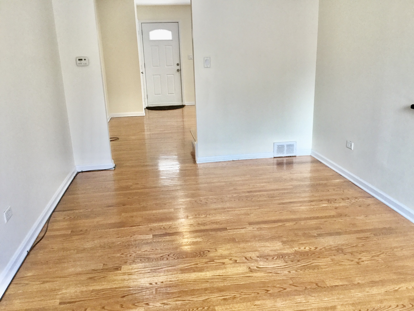 2016 Maple Avenue Northbrook, IL 60062 - Photo 11 of 32 a view of a hallway with wooden floor