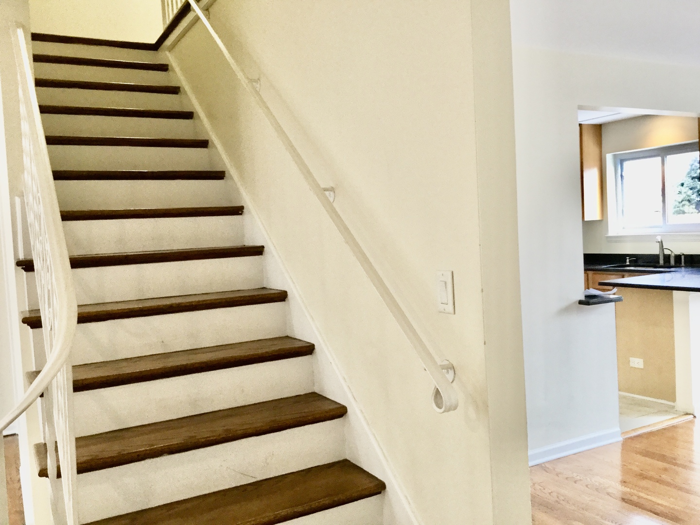 2016 Maple Avenue Northbrook, IL 60062 - Photo 18 of 32 a view of entryway with wooden floor and stairs