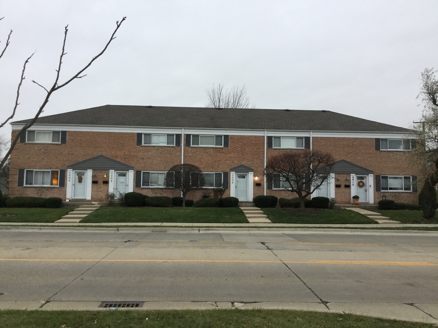 2016 Maple Avenue Northbrook, IL 60062 - Photo 32 of 32 a front view of a house with a yard and garage